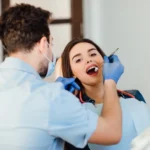 Hygienist performing a professional teeth cleaning at One Dental Place, Fresno, CA 93720