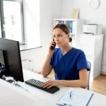 Front desk team explaining a treatment estimate at One Dental Place, Fresno, CA 93720