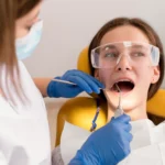 A Fresno dentist examining a patient for an emergency dental treatment at One Dental Place.