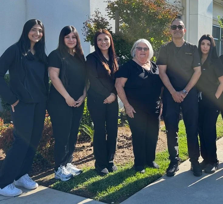 One Dental Place Fresno dental team standing together outside the clinic in Fresno, California